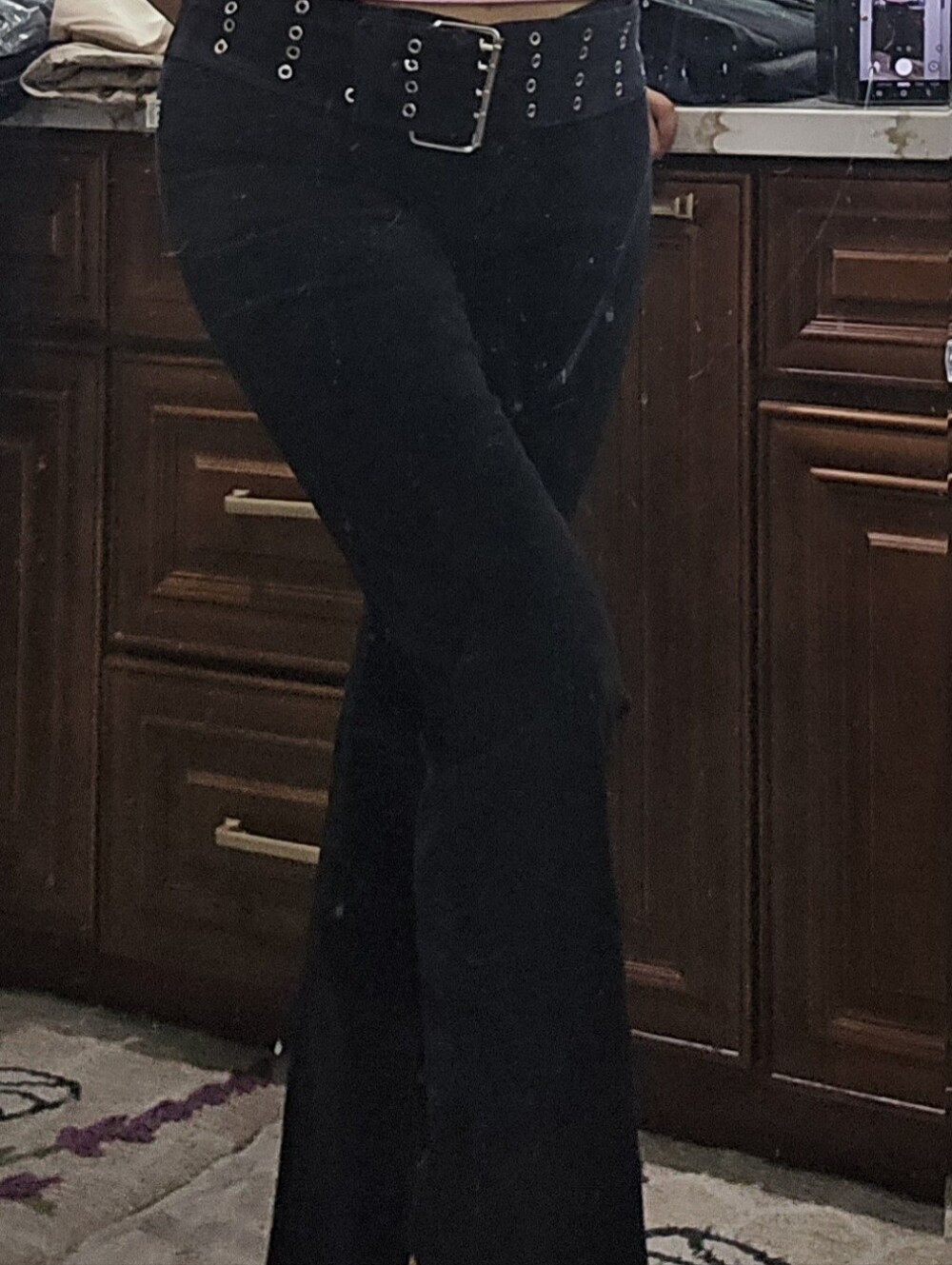 High-Waist Black Flared Pants with Eyelet Belt From MAX studio.
